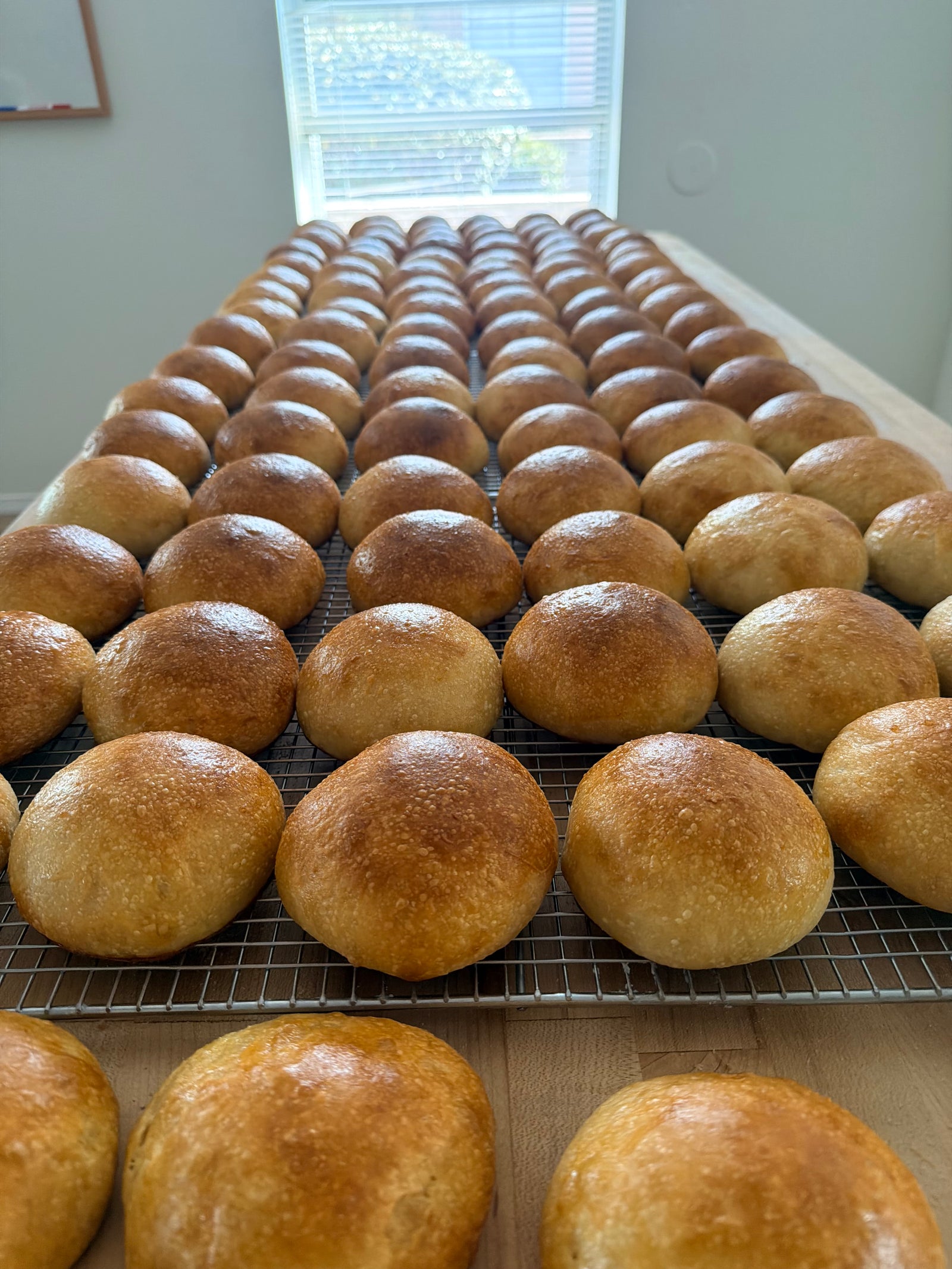 Sourdough focaccia ingredients and dough in an Eat Well ABQ kitchen