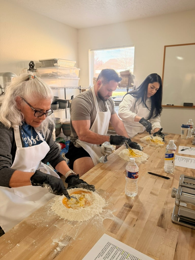 Chef Evangalene explaining the live Eat Well ABQ class calendar