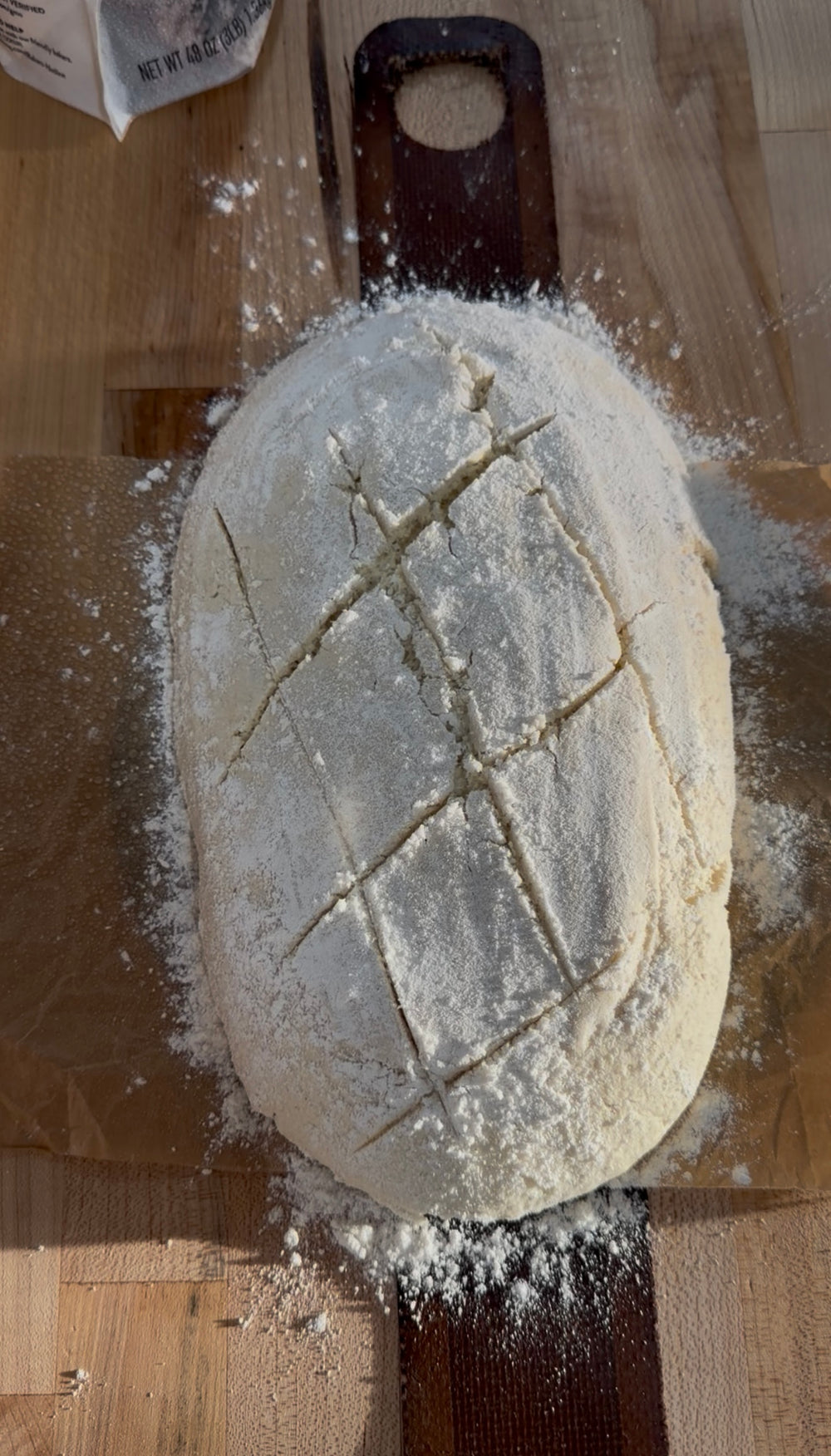 Shaping scoring and baking a sourdough loaf