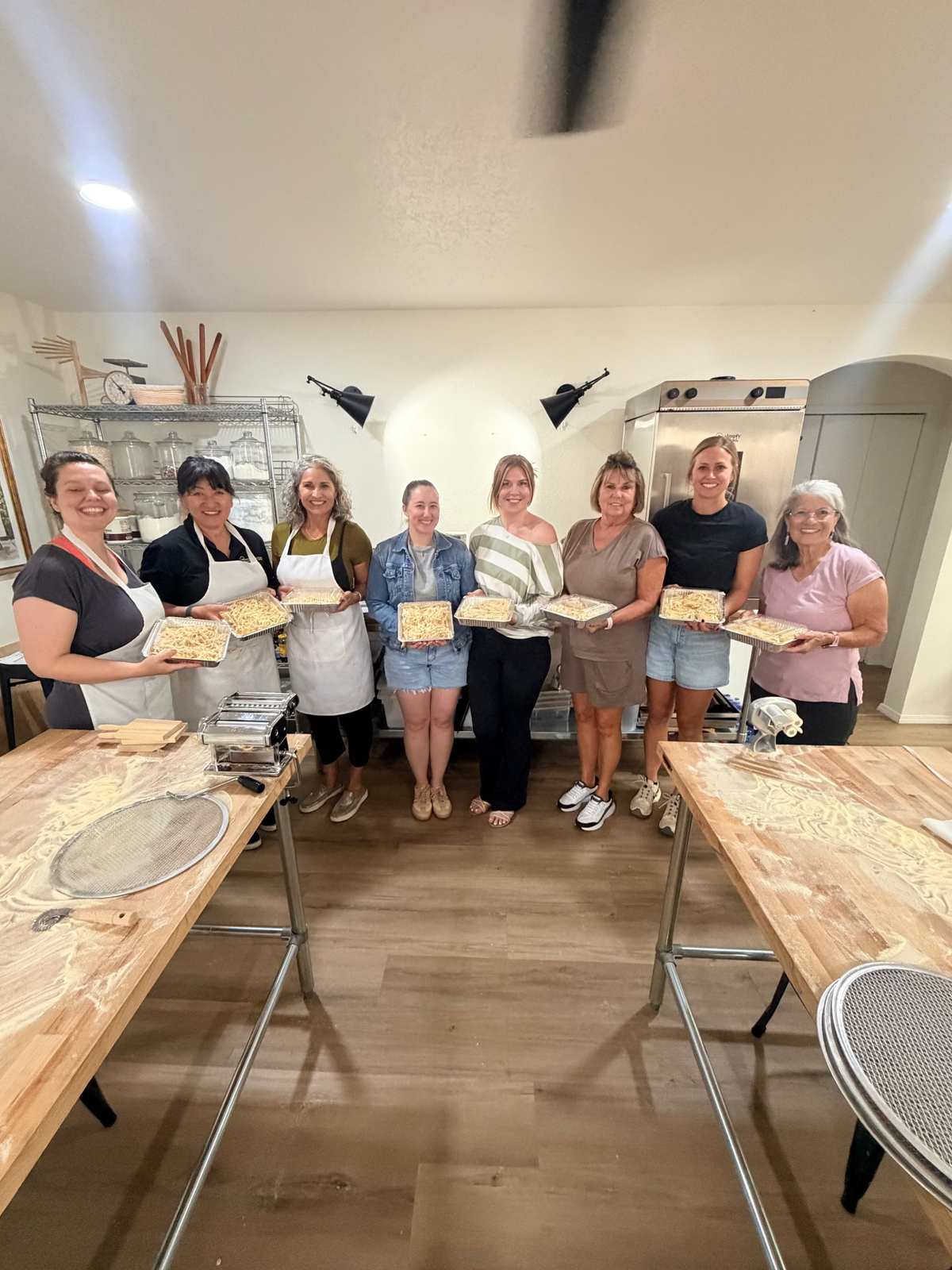 Students learning in a hands-on cooking and baking class in Albuquerque