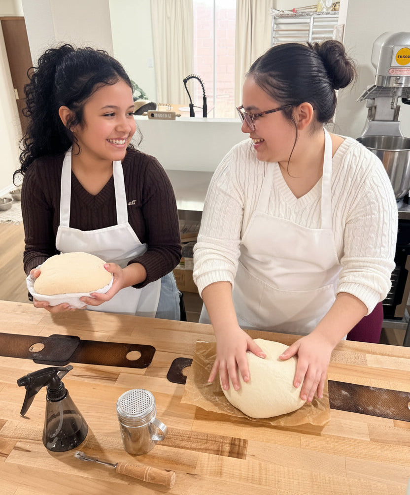 Students learning in a hands-on baking class at Eat Well ABQ in Albuquerque