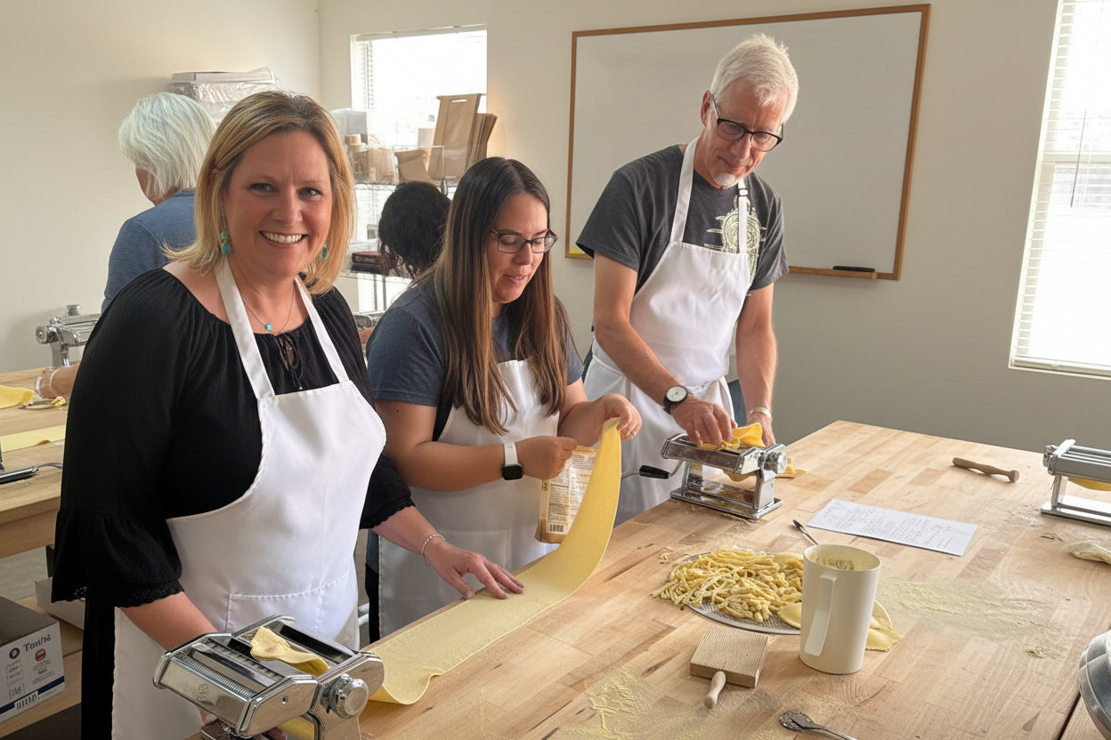 Group of people taking a hands on baking class
