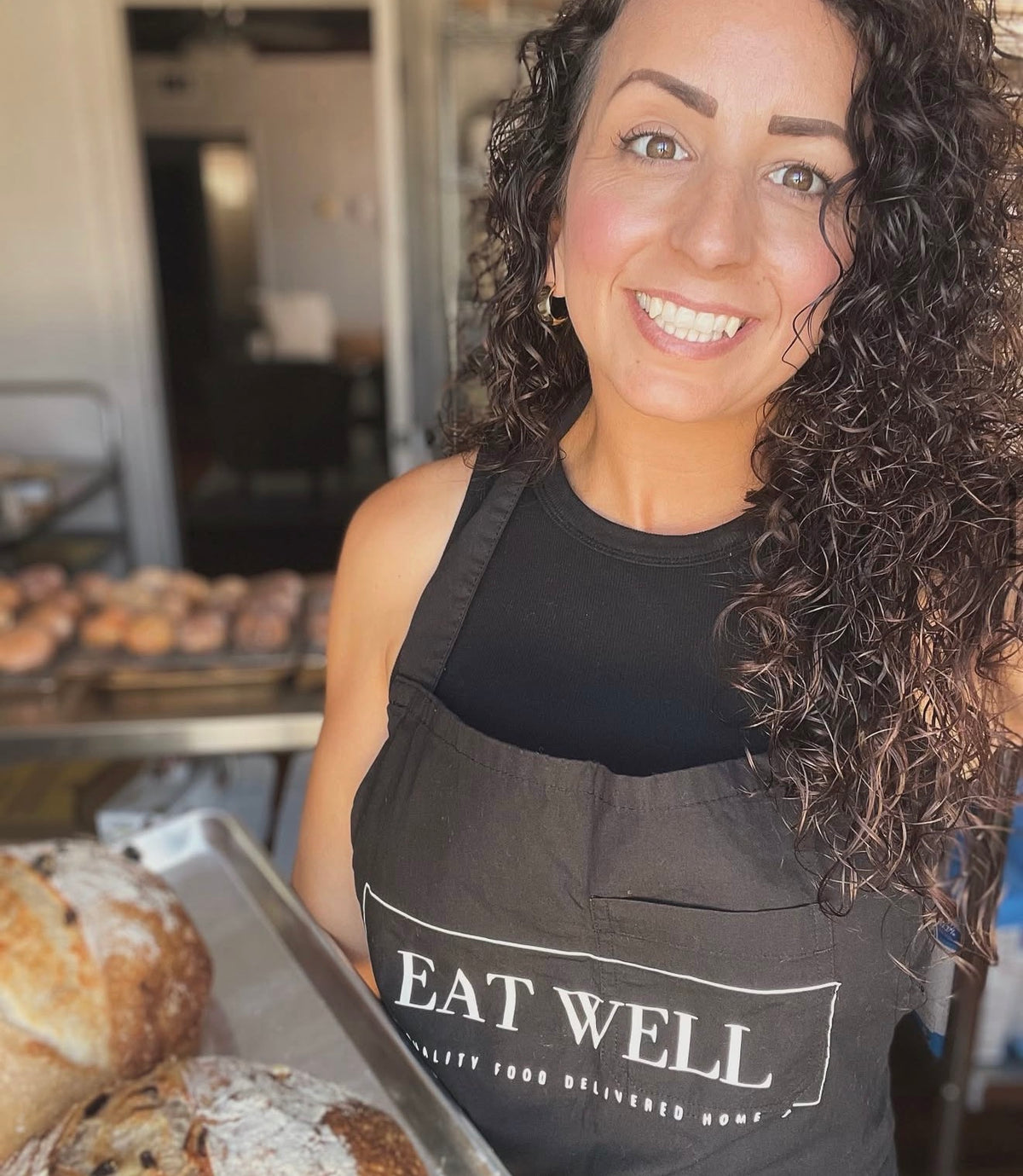 eat well located in Albuquerque, founder evangaliene featured in photo. 